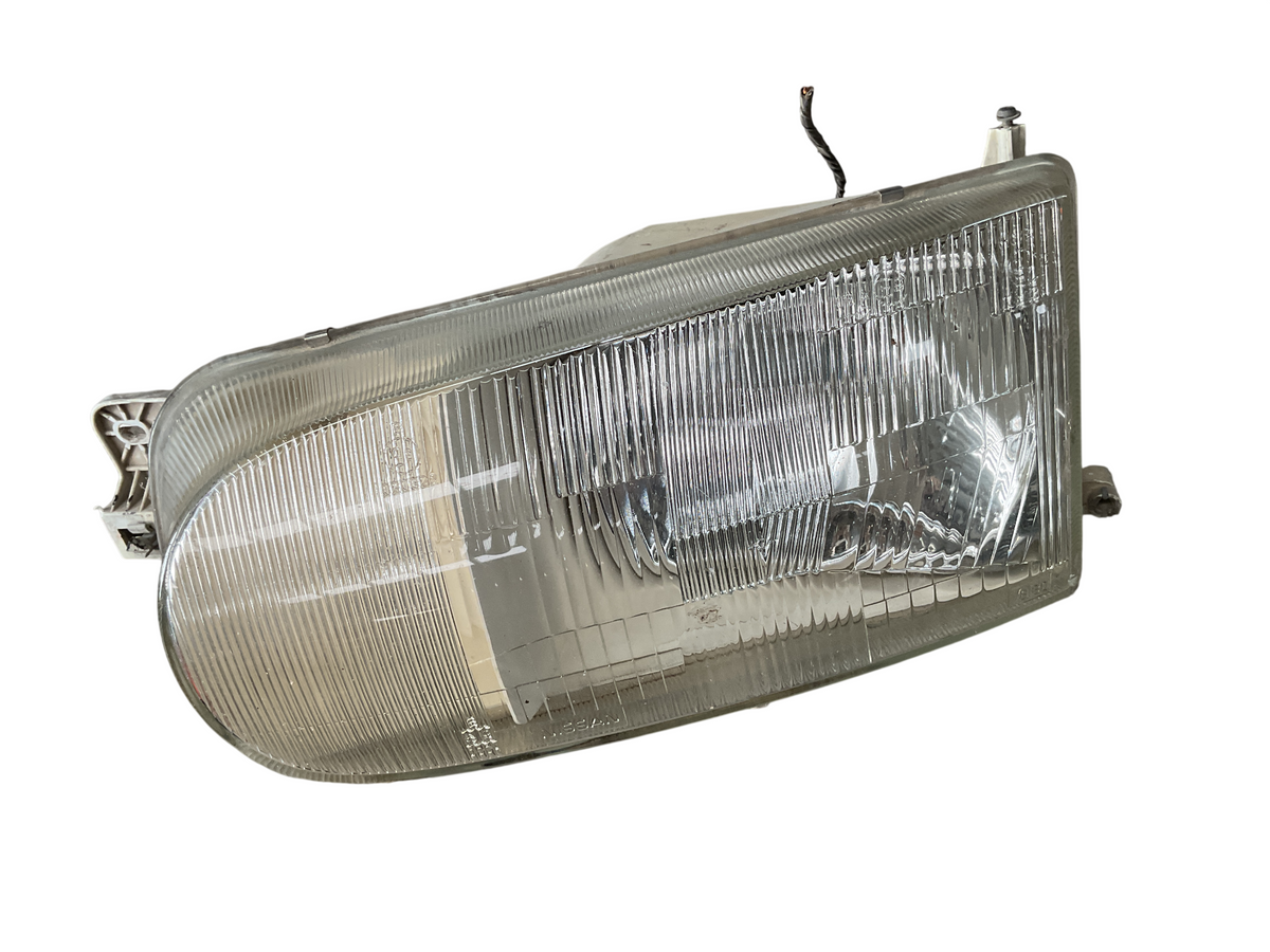 Faro del izq Nissan Serena 92-03 260607C002