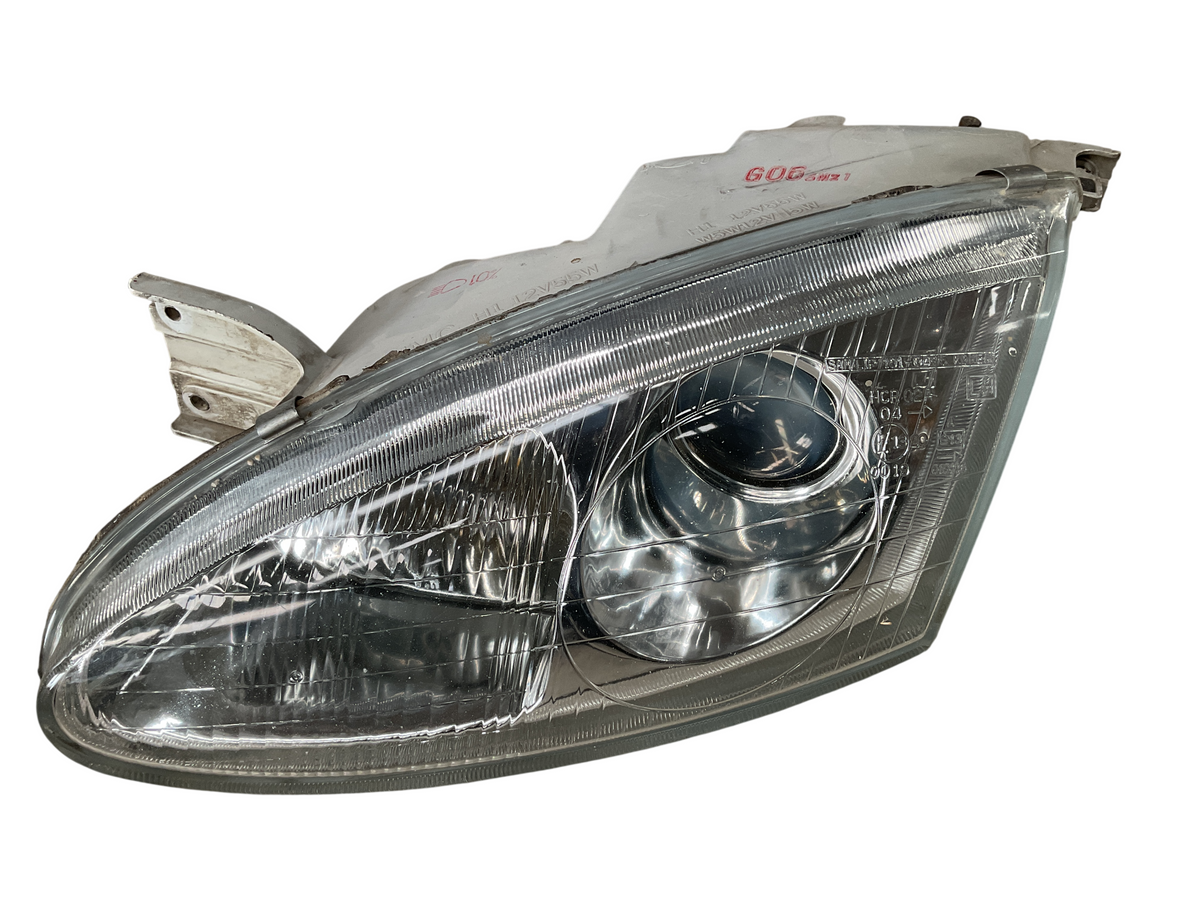 Faro del izq Hyundai Coupe 96-02 9210327060