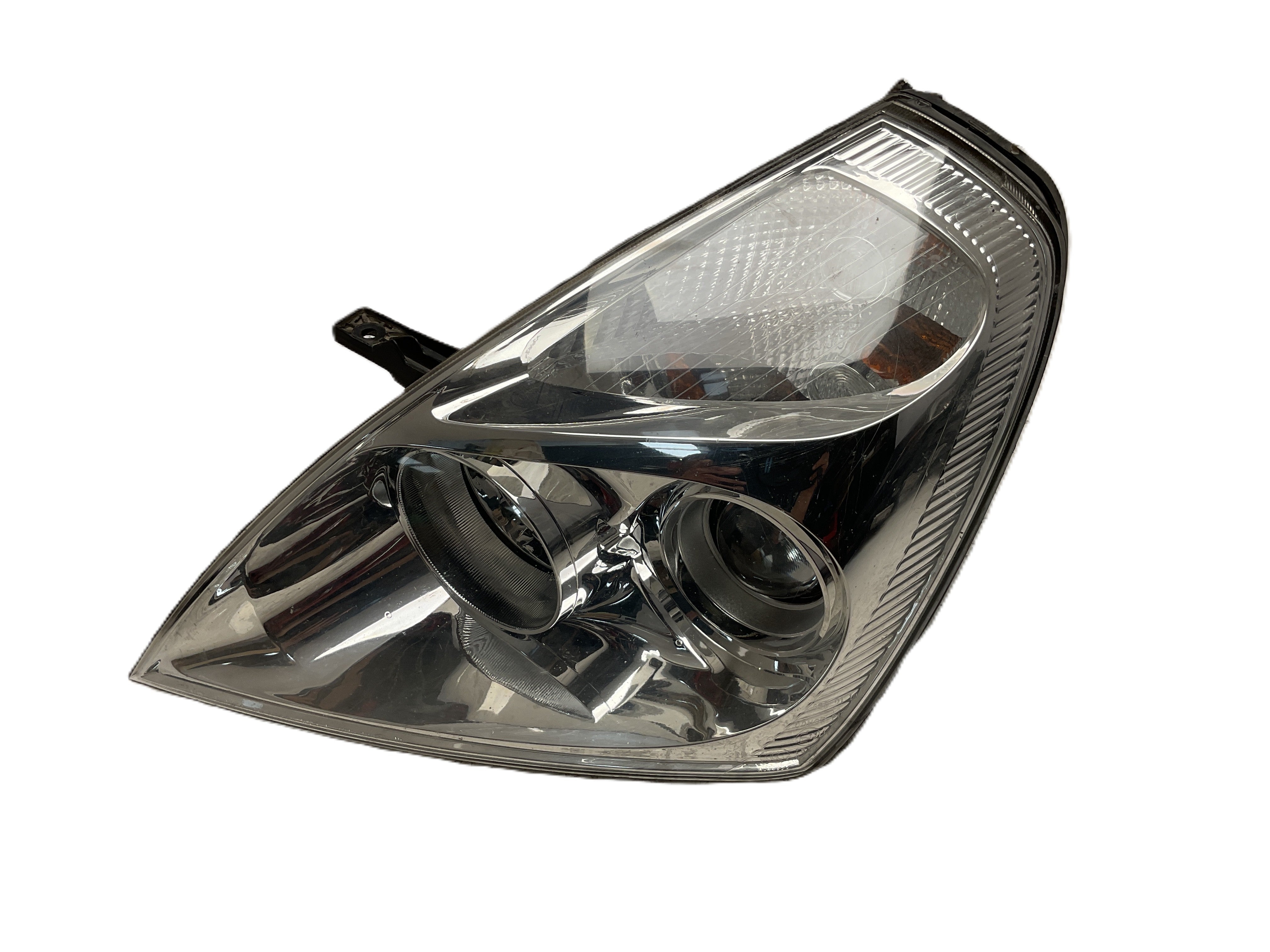 Faro del izq Kia Carnival III 06-15