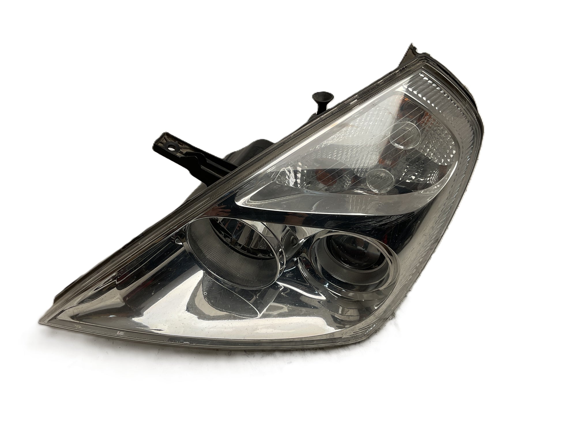 Faro del izq Kia Carnival III 06-15