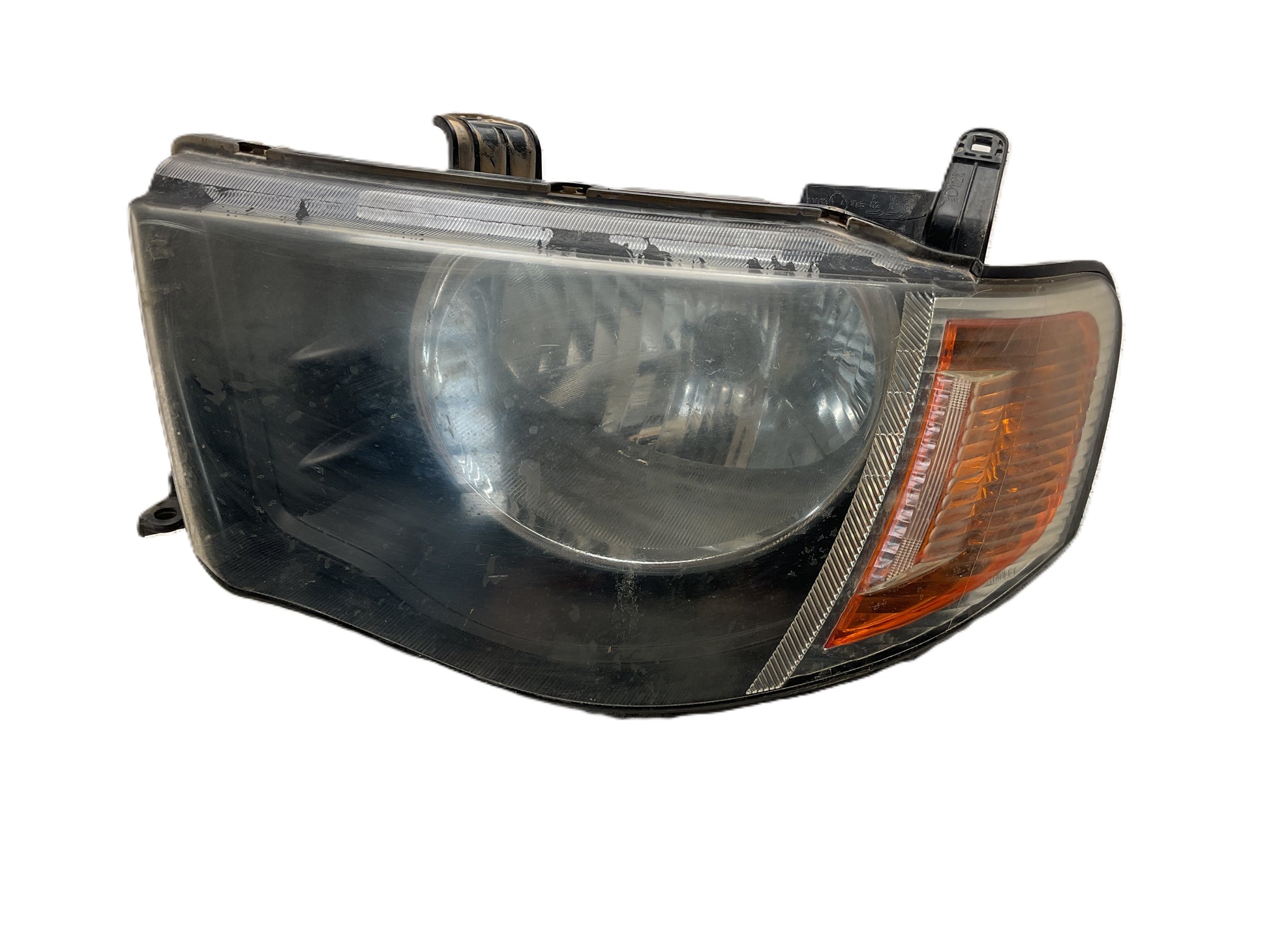 Faro del izq Mitsubishi L200 05-15