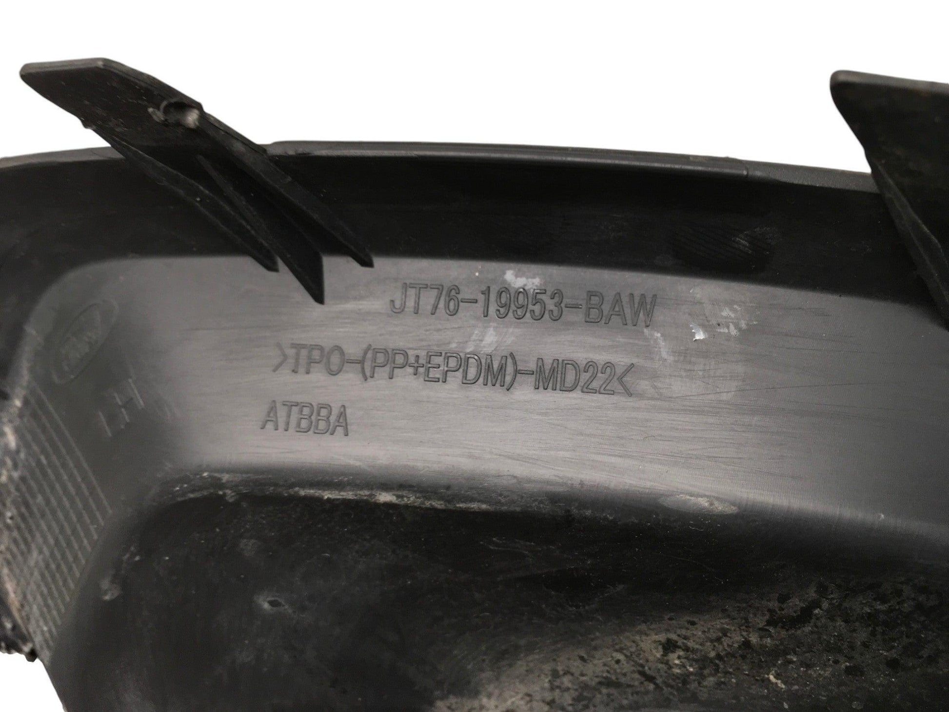 Cubierta antiniebla izq Ford Transit Courier - JT7619953BAW