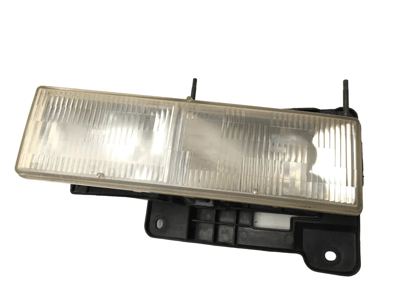 Faro izq Chevrolet Tahoe GMT400
