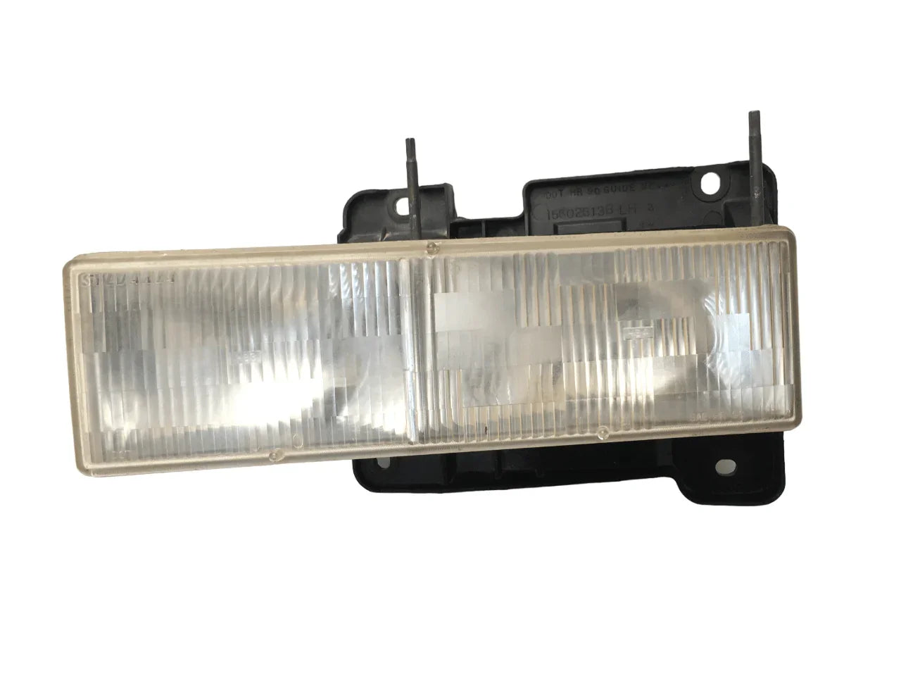 Faro izq Chevrolet Tahoe GMT400