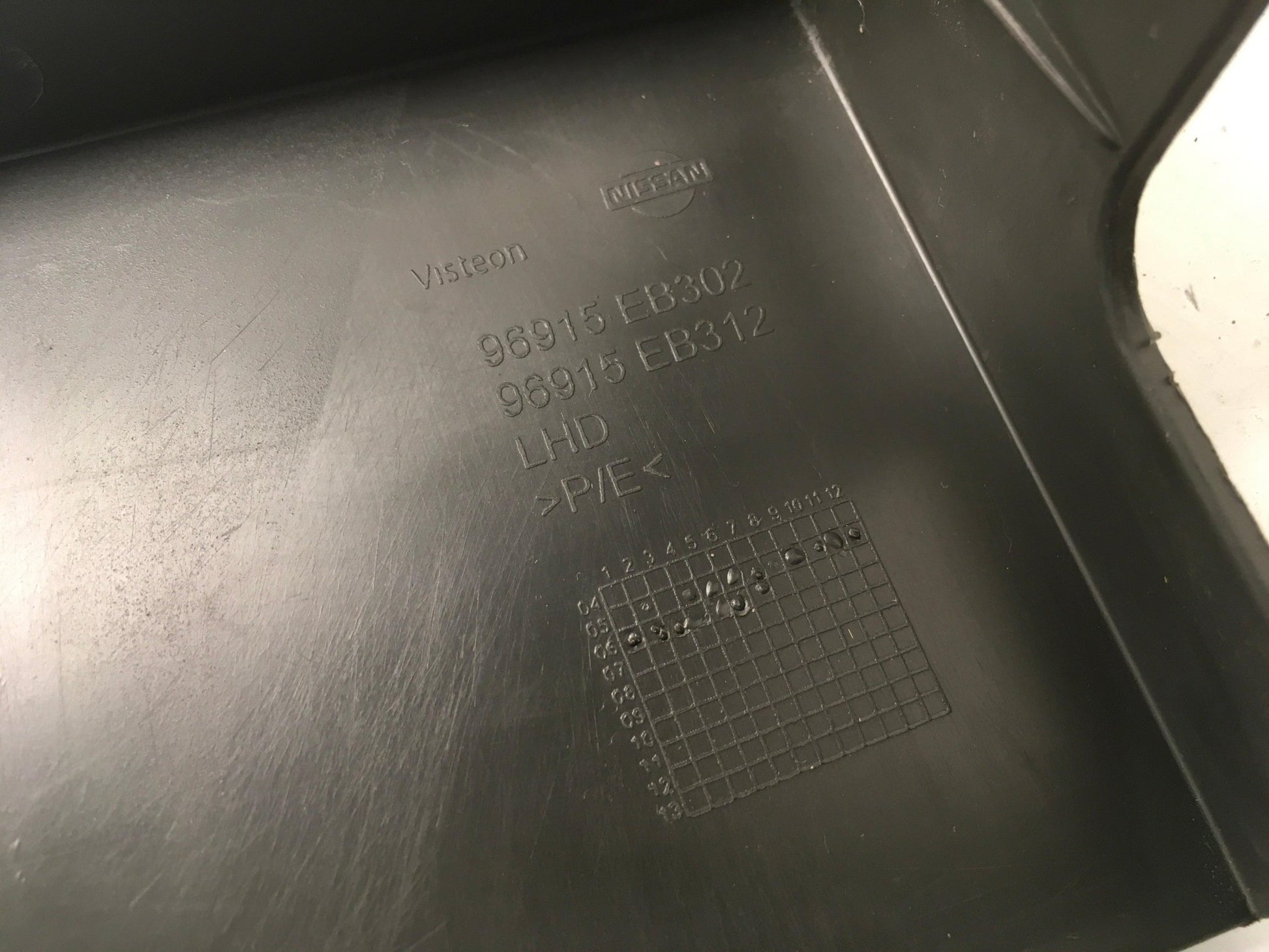 Moldura Consola central Nissan Frontier 2 - 96915EB302