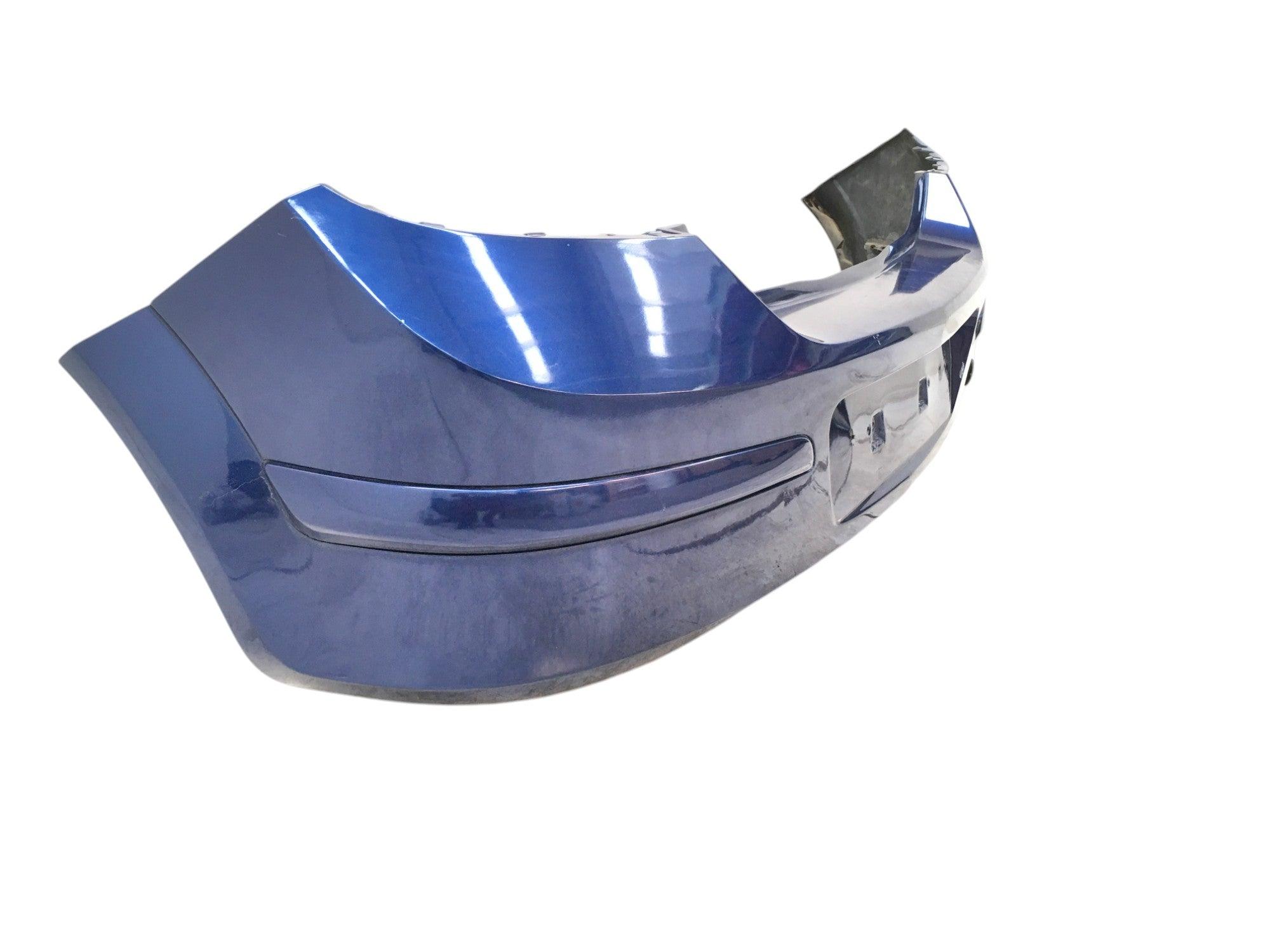 Paragolpes trasero Opel Astra H Hatchback - 1404175