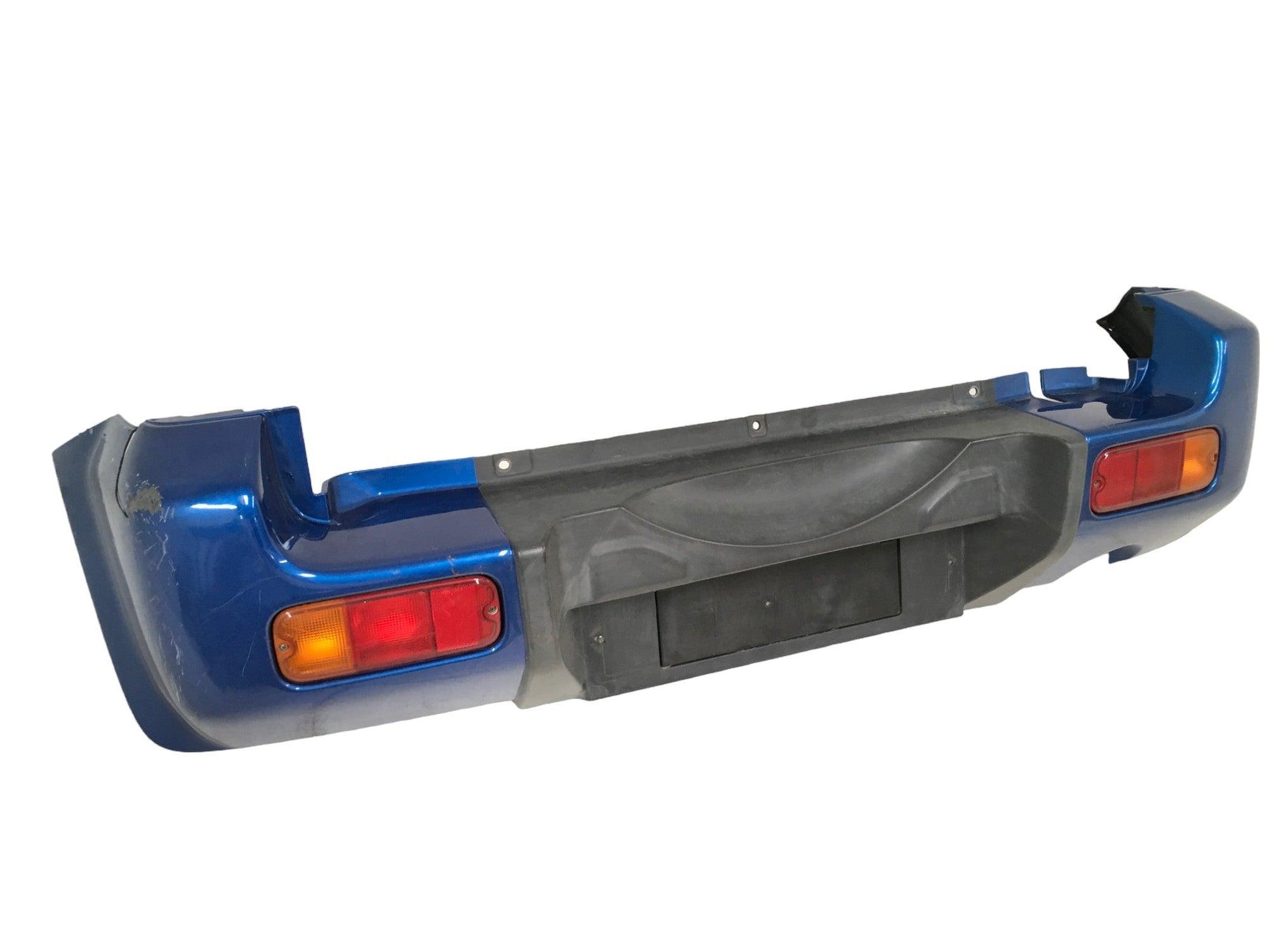 Paragolpes trasero Suzuki Jimny FJ - 7181181A00