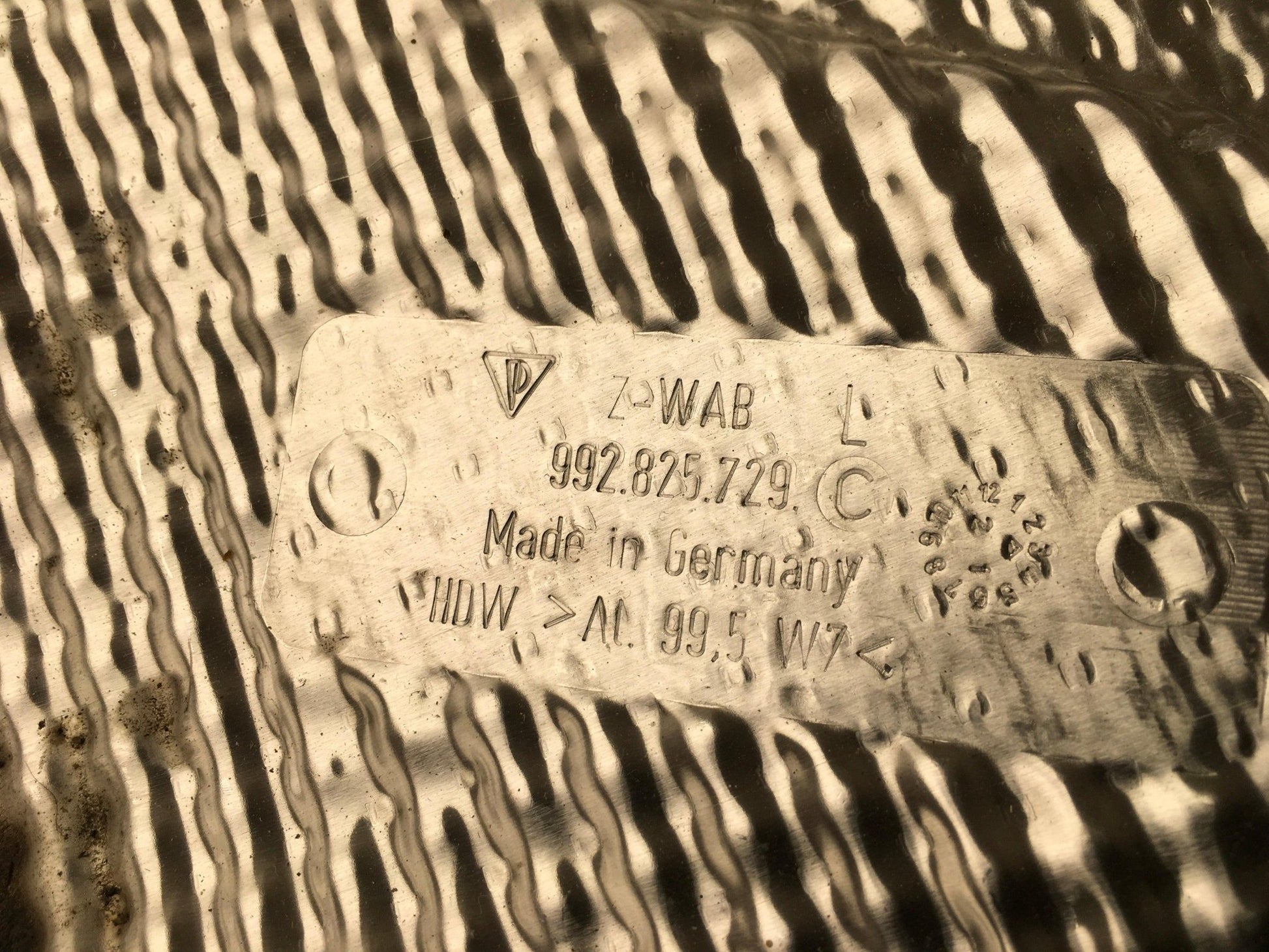 Protector termico tra izq Porsche 911 992 - 992825729C