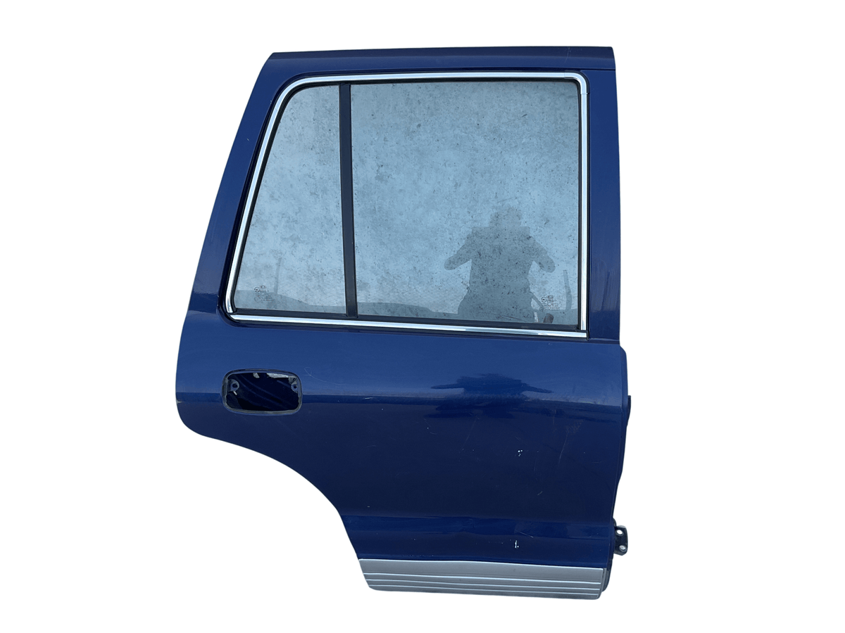 Puerta tra dcha KIA Sportage 94-03 - 0K01F72020