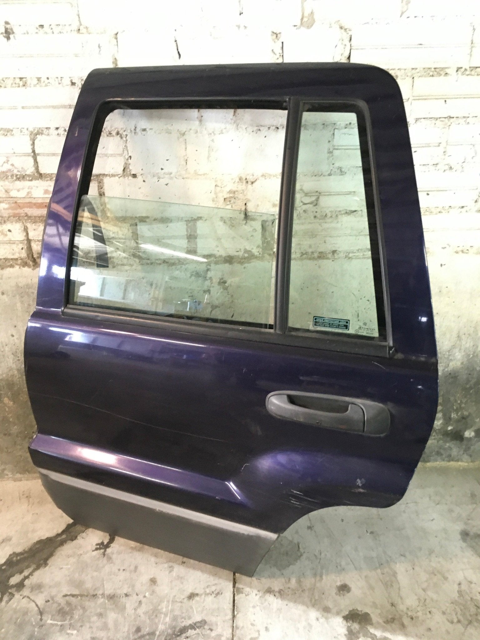 Puerta tra izq Jeep Grand Cherokee II - 55136701AG