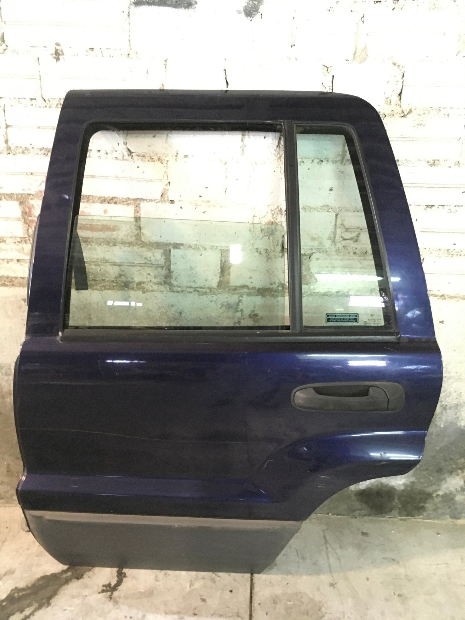 Puerta tra izq Jeep Grand Cherokee II - 55136701AG