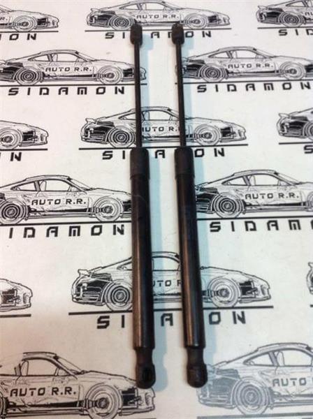 Amortiguadores porton golf vi - 