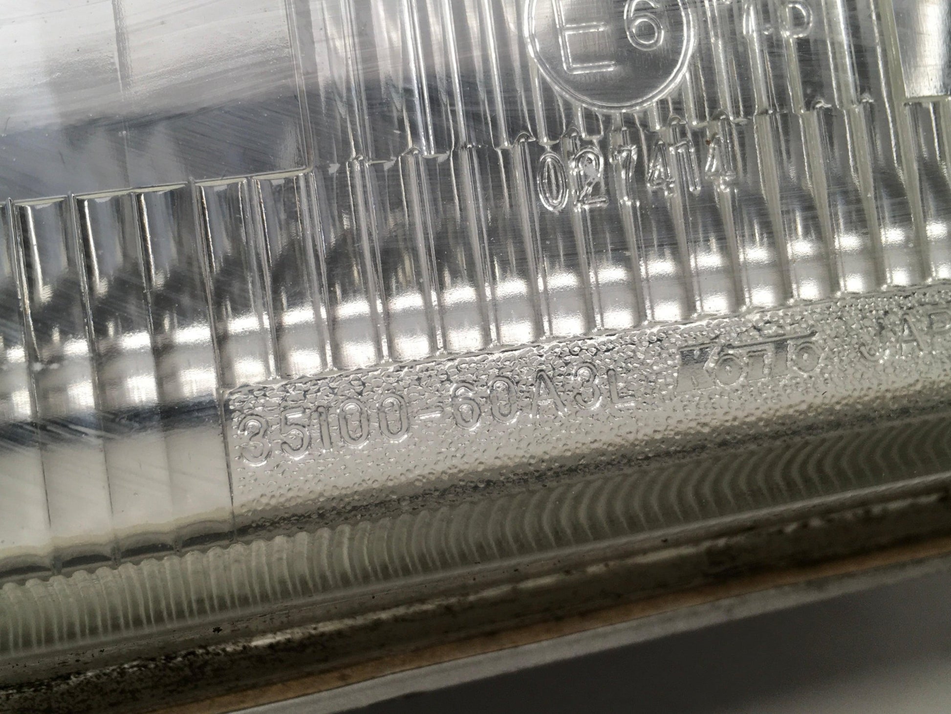 Faro izquierdo Suzuki Vitara I - 10032224L