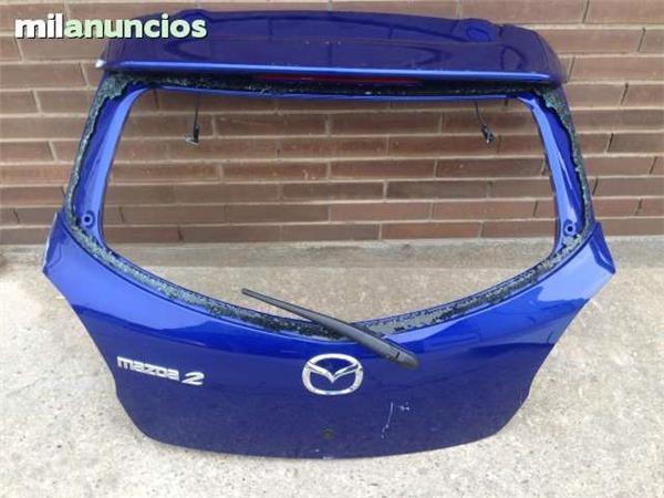 Porton trasero mazda 2 - 