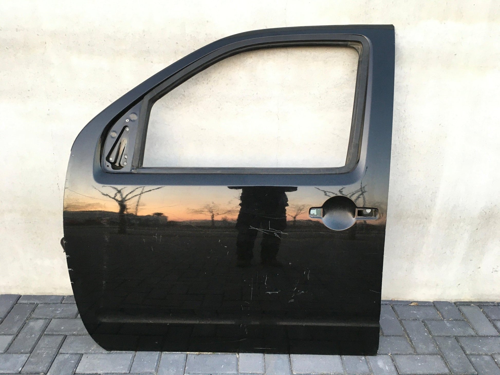 Puerta delantera izq Nissan Navara D40 - 80101EB330