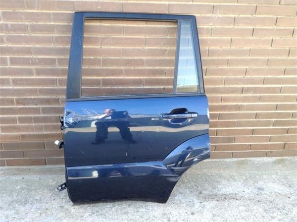 Puerta tras izq toyota land cruiser 120 - 