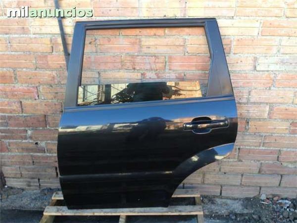 Puerta traser izquierda ssangyong rexton - 