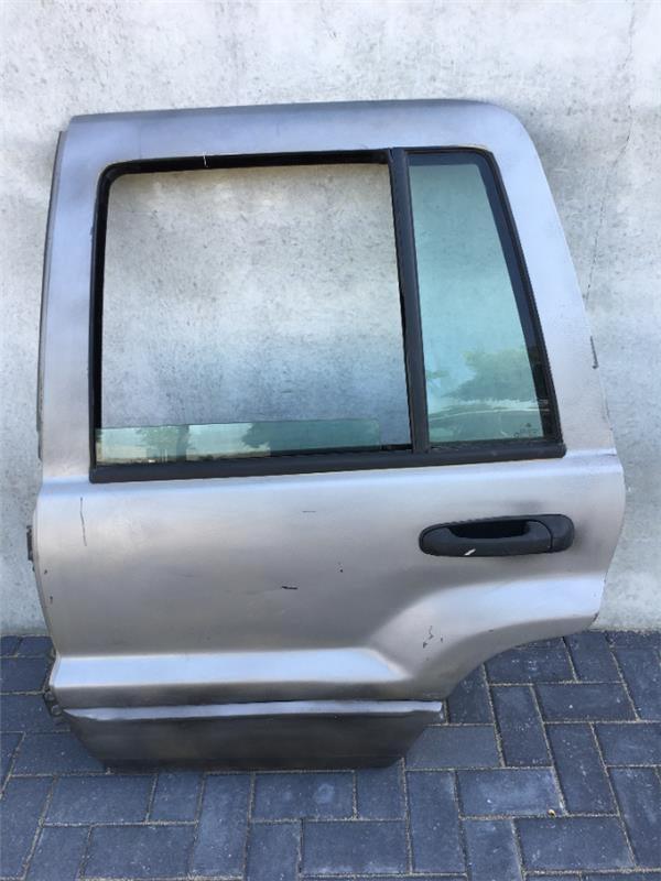 Puerta trasera izq Jeep WG WJ - AutoRR 