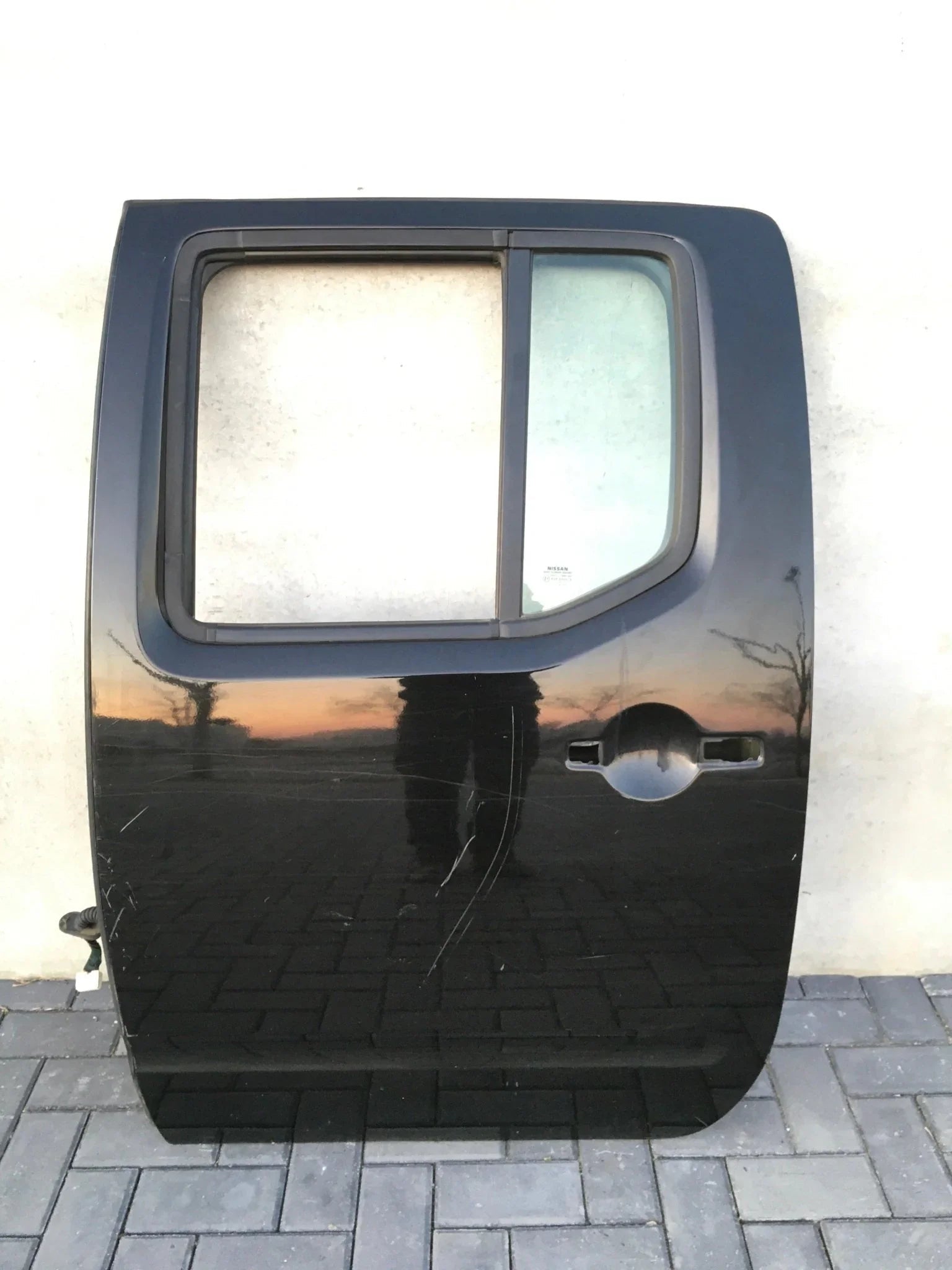 Puerta trasera izq Nissan Navara D40