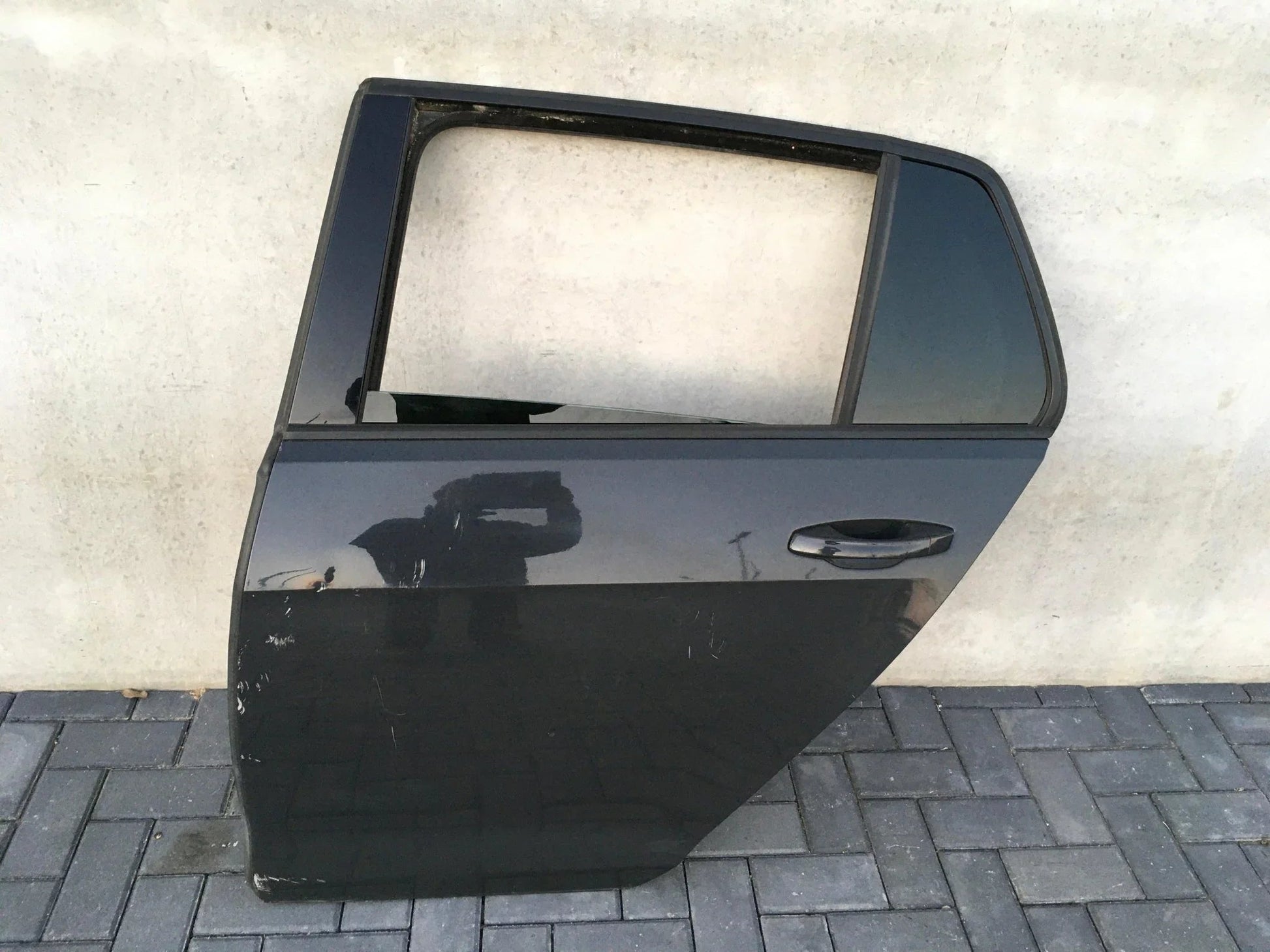 Puerta trasera izq volkswagen golf 7 negra