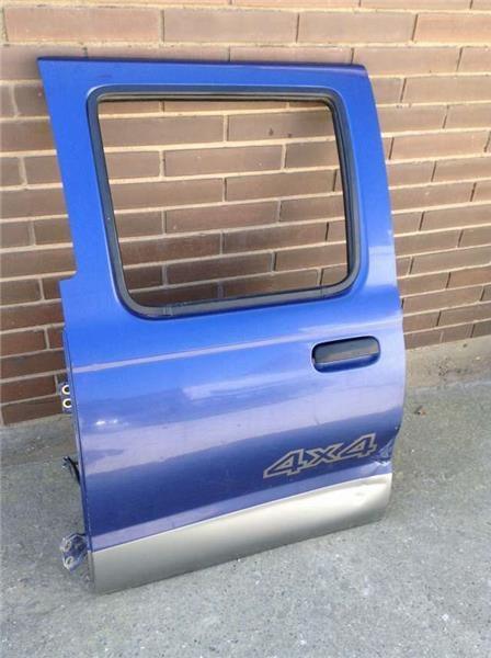 Puerta trasera izquie nissan navara d22 - 