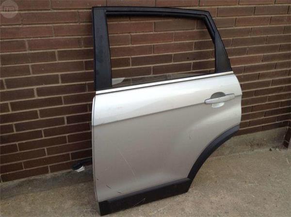 Puerta trasera izquier chevrolet captiva - 
