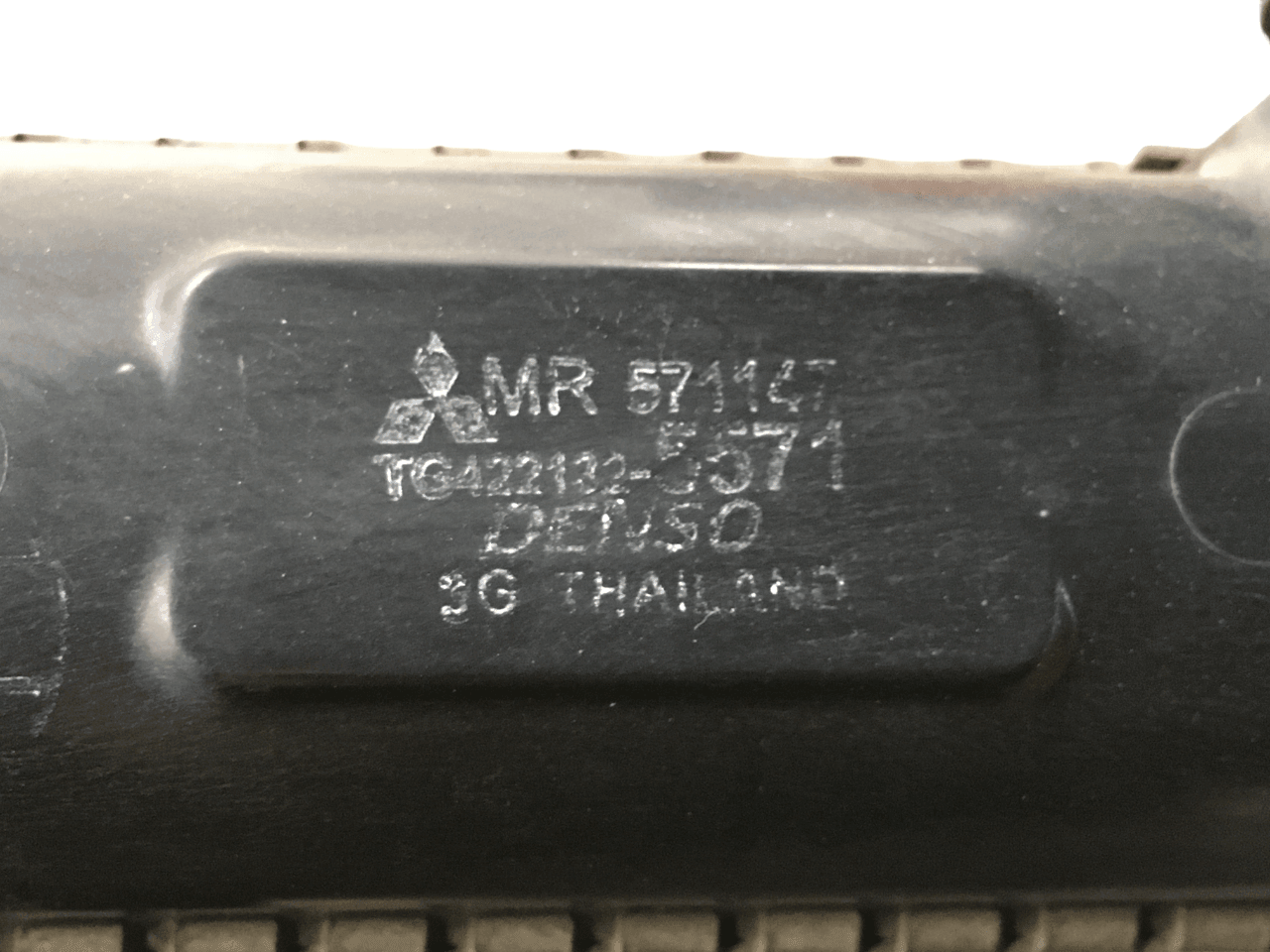 Radiador Mitsubishi 3 L200 - MR571147